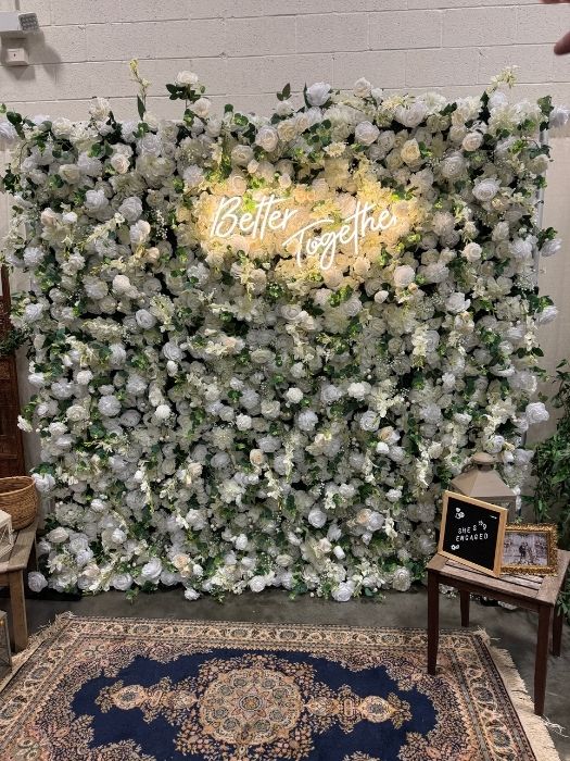 White rose floral wall with 'Better Together' neon sign, available for rent from Simply LaMayed for weddings, showers, and celebrations across Northern Virginia.