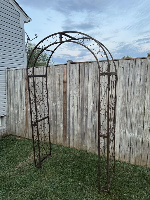 Elegant metal arch with scrollwork design available for weddings, events, and photo displays from Simply LaMayed Custom Decor in Northern Virginia.