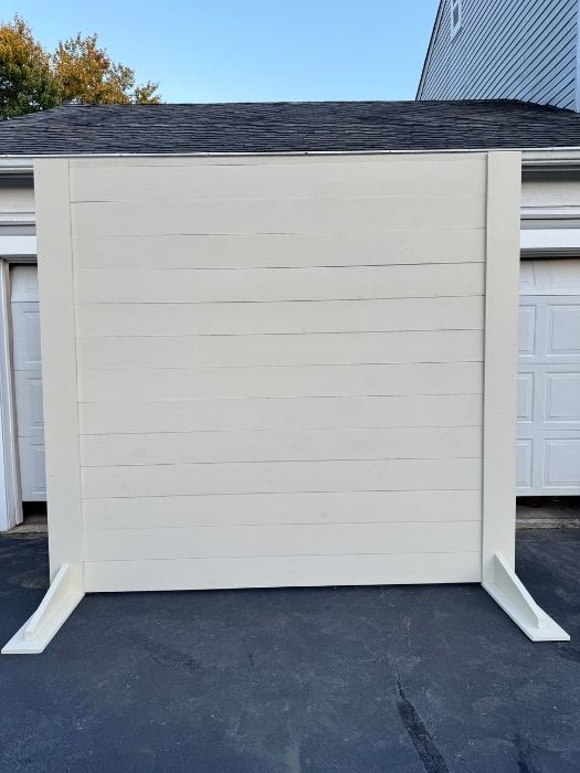 Neutral wood wall backdrop for custom signage, weddings, and corporate events, available for rent from Simply LaMayed Custom Decor